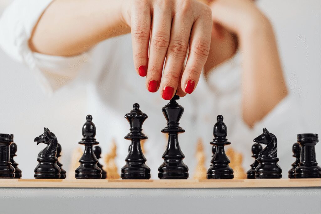 woman playing chess