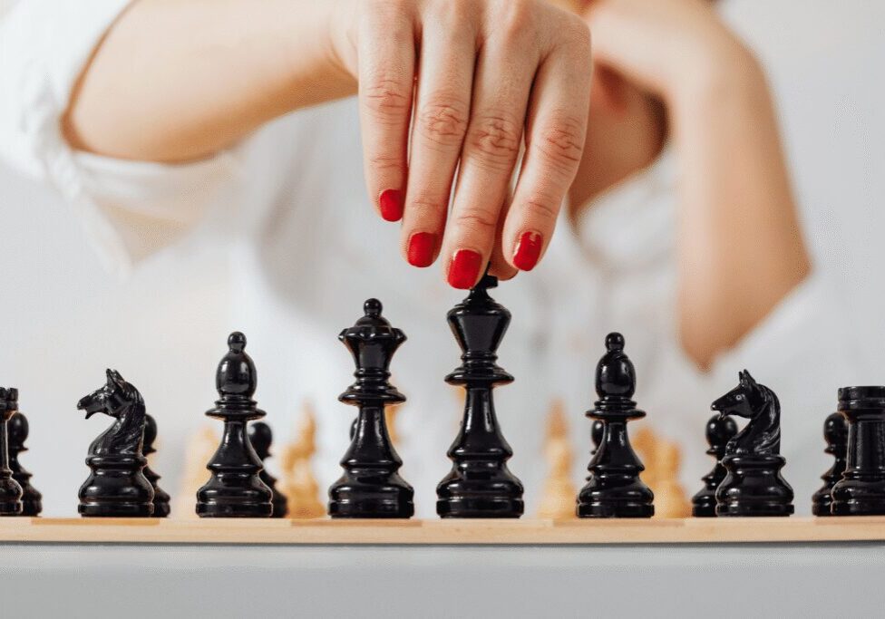 woman playing chess